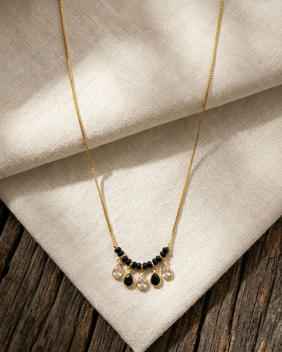 Elegant Black Beaded Gold Teardrop Mangalsutra Necklace