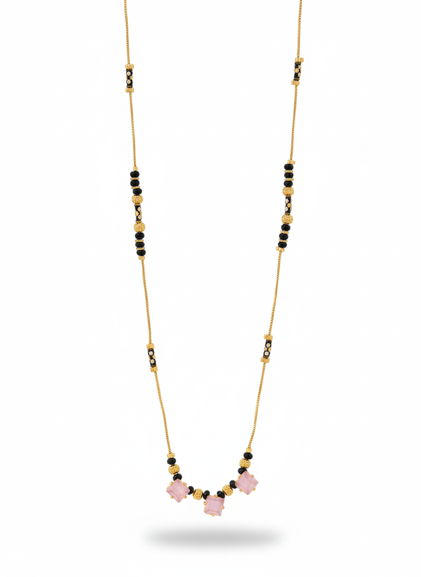 Necklace with pink beads and gold chain on a white background