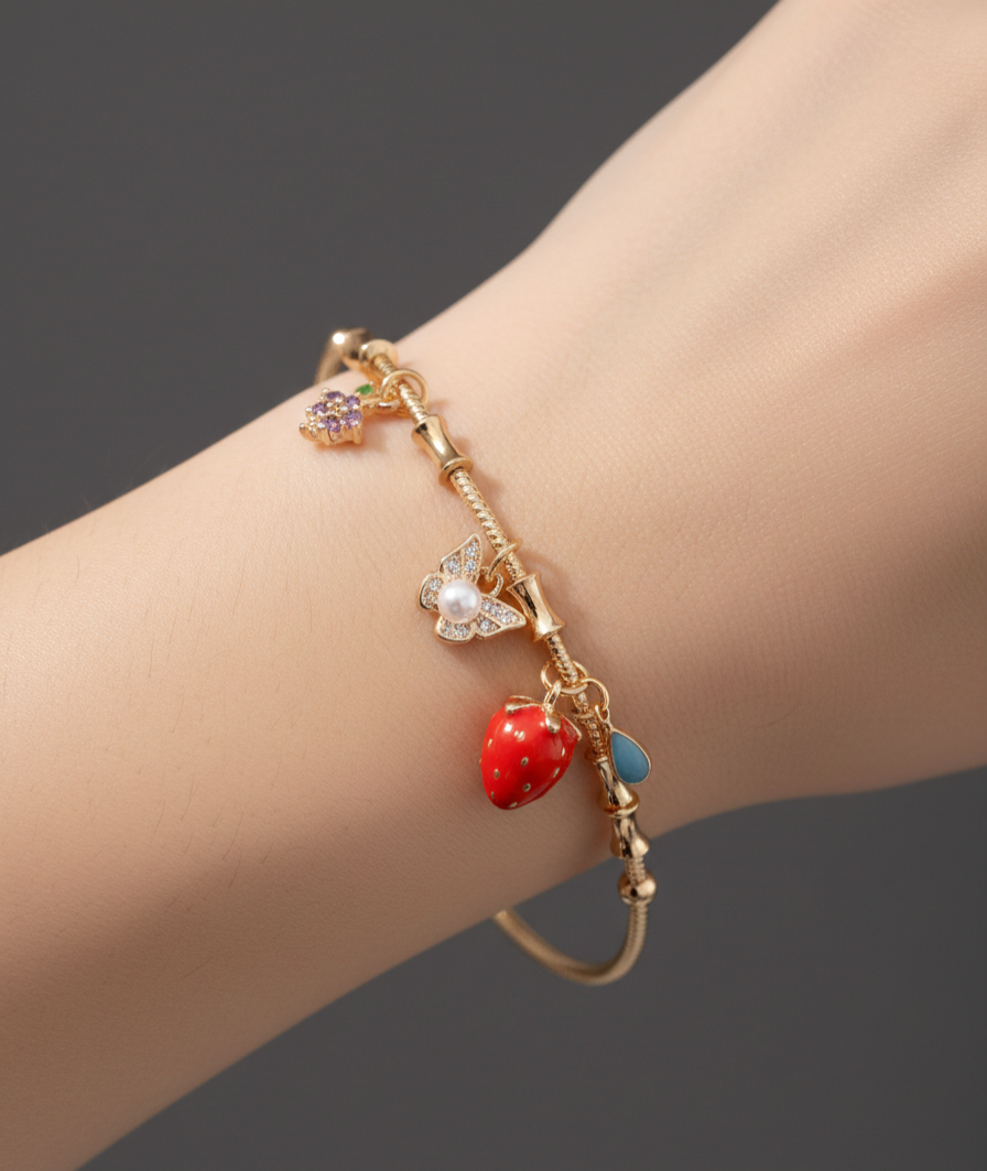 Handcrafted Artisanal Charm Bracelet with Strawberry & Floral Motifs