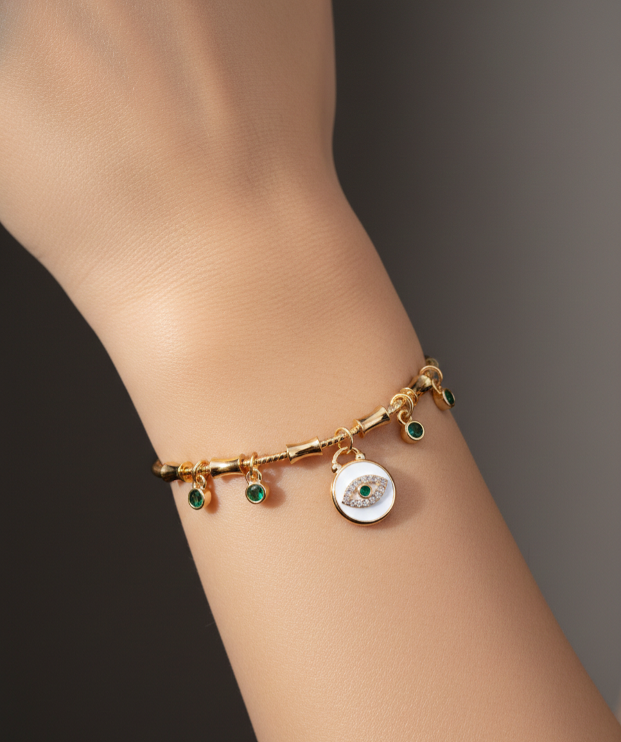 Handcrafted Artisanal Evil Eye Bracelet with Emerald Accents