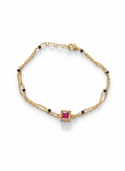 Gold bracelet with a red gemstone,
valentines gift 