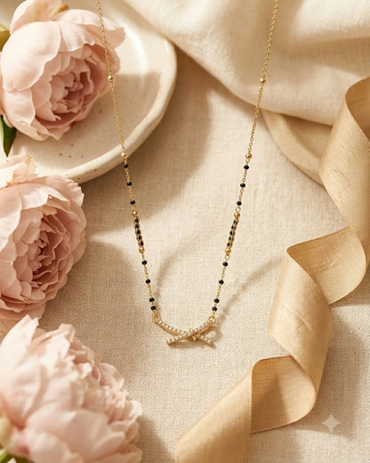 Elegant Bow Charm Gold & Black Beaded Mangalsutra