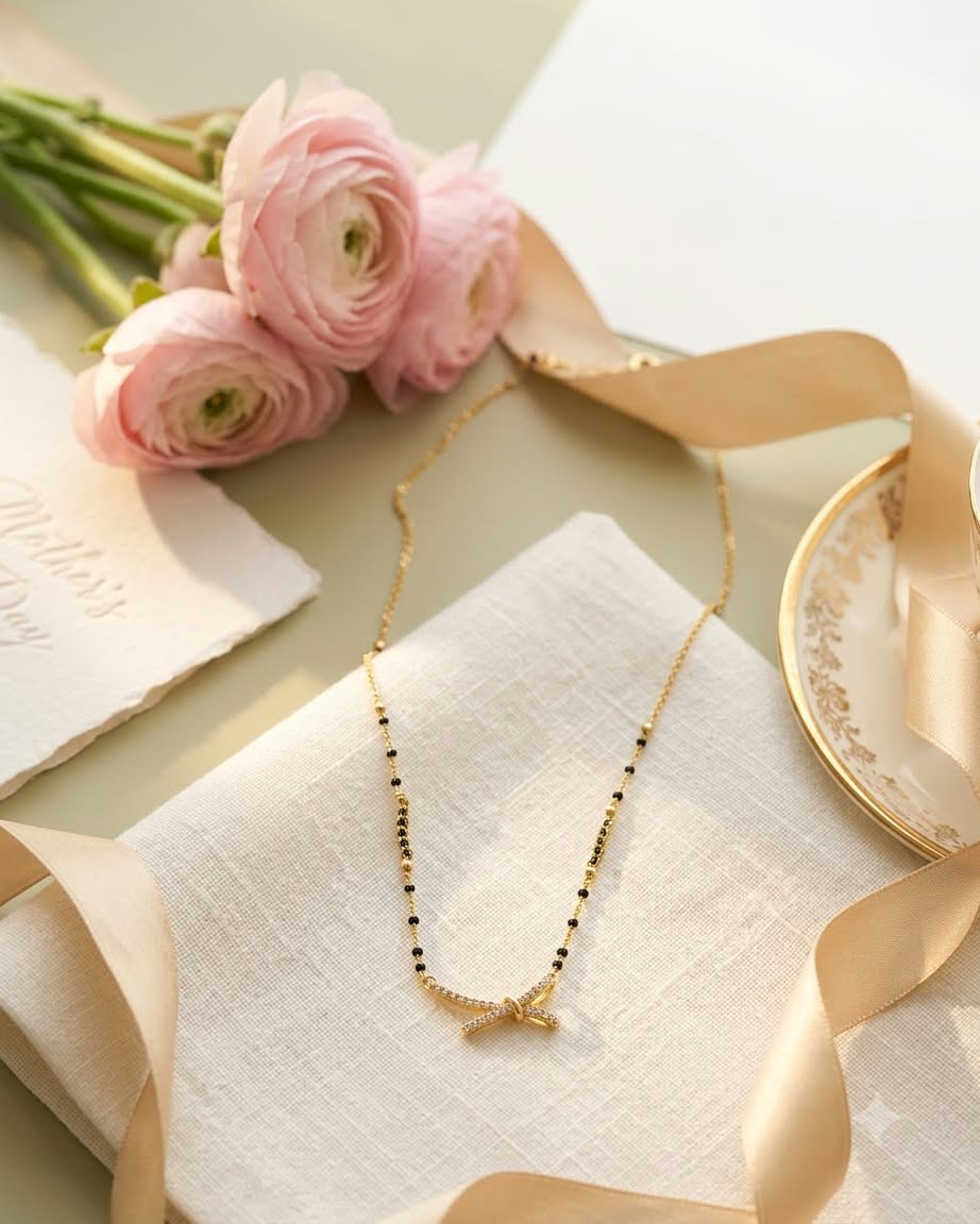 Elegant Bow Charm Gold & Black Beaded Mangalsutra