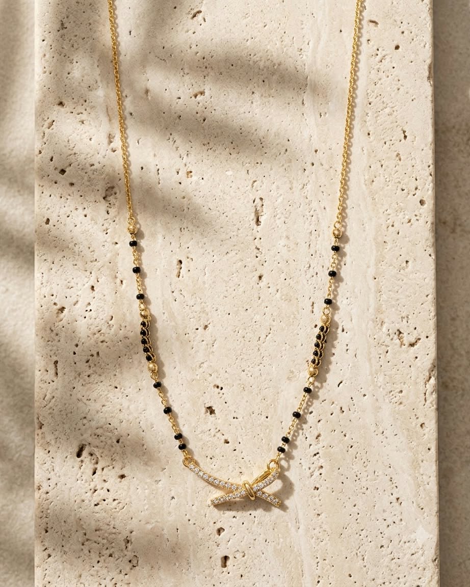 Elegant Bow Charm Gold & Black Beaded Mangalsutra