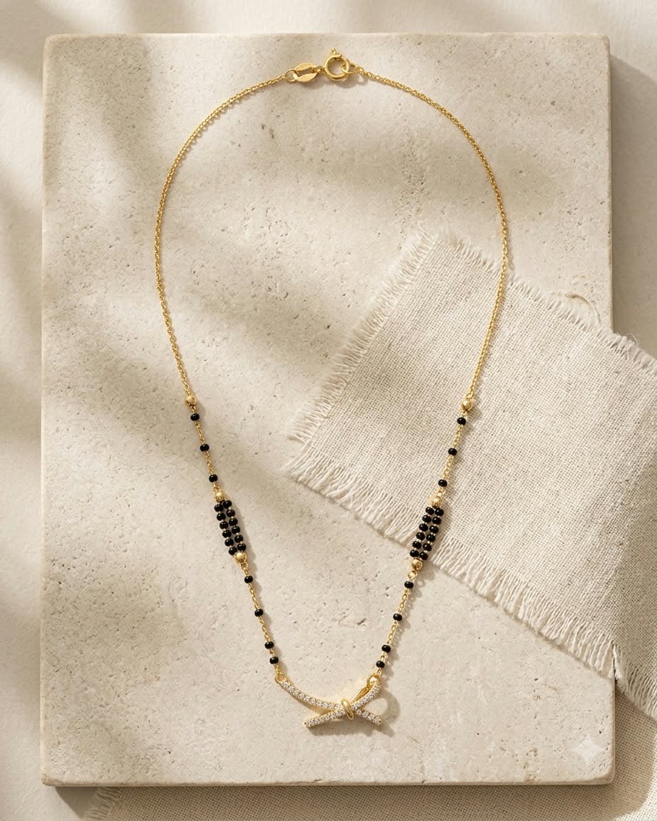 Elegant Bow Charm Gold & Black Beaded Mangalsutra