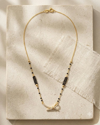 Elegant Bow Charm Gold & Black Beaded Mangalsutra