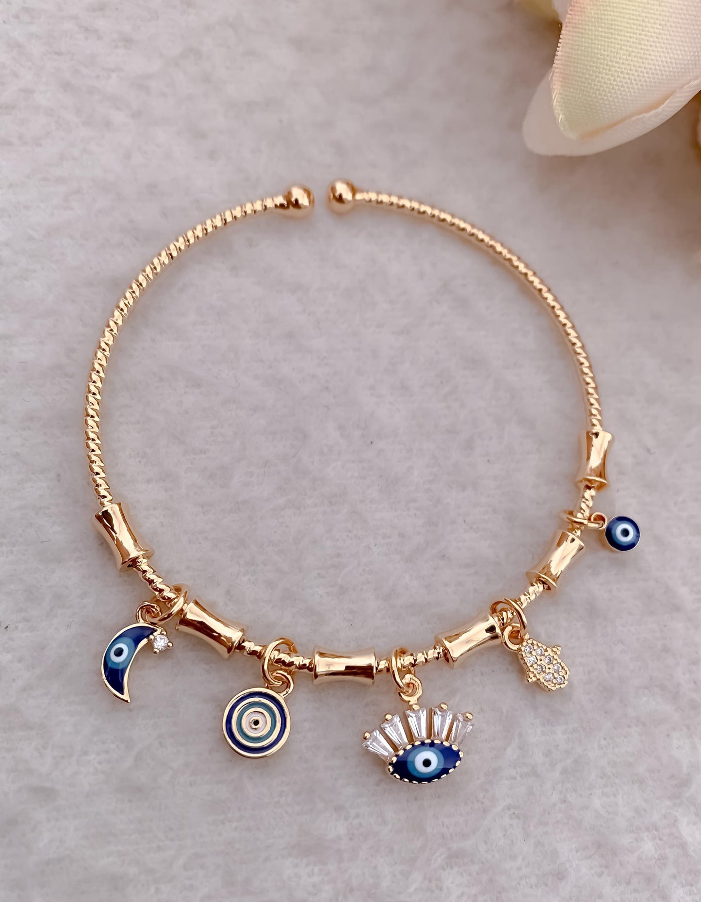 Artisanal Evil Eye Charm Bracelet in Gold Finish