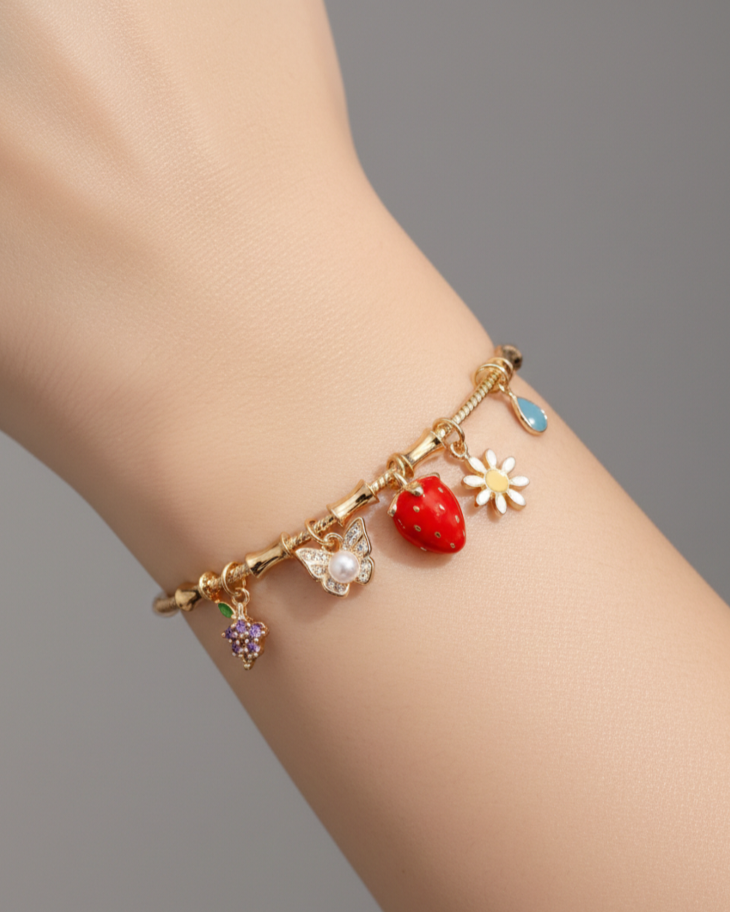 Handcrafted Artisanal Charm Bracelet with Strawberry & Floral Motifs