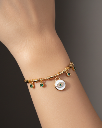 Handcrafted Artisanal Evil Eye Bracelet with Emerald Accents